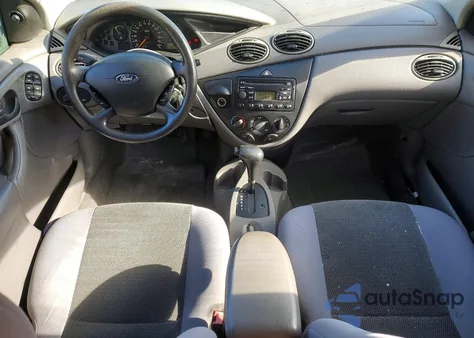 2004 Ford Focus Se Comfort z USA, uszkodzony, nr VIN 1FAFP34ZX4W143997